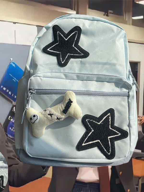Mochila con colgante de hueso con parche de estrella-1