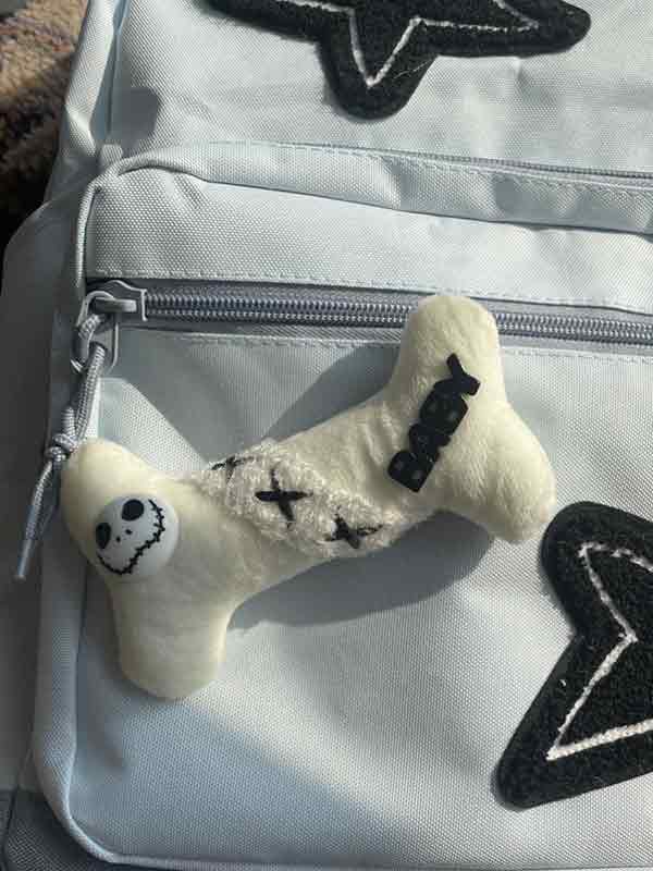 Mochila con colgante de hueso con parche de estrella-2