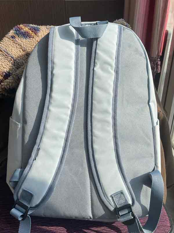 Mochila con colgante de hueso con parche de estrella-3